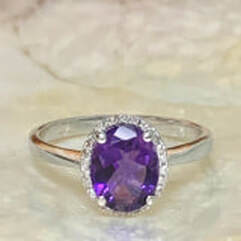 Your Daytona family jewelers has this Vintage dainty amethyst and diamond ring in white gold