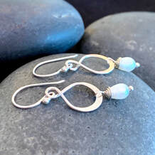 ​Vintage charming freshwater pearl earrings in sterling silver from your Daytona jeweler!